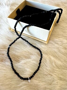 Black peacock crystal necklace w/ tiny diamond